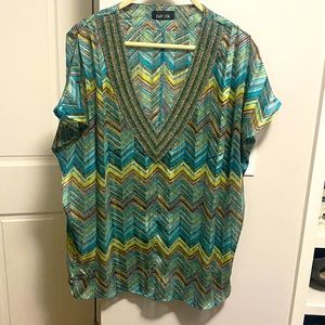 Fabrik blouse with beaded v-neck